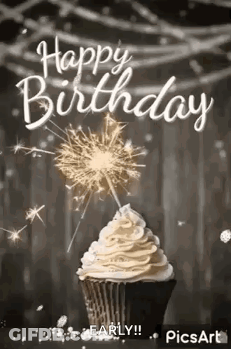 Cupcake With Whipped Cream And Sparkler GIF