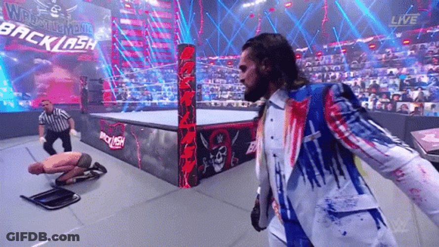 Curb Stomp Of Seth Rollins Cesaro GIF