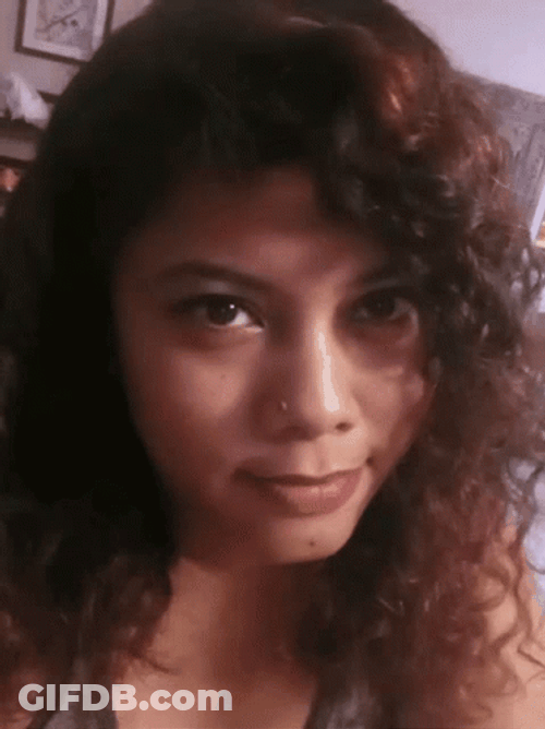 Curly Girl Bite GIF