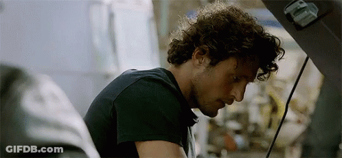 Curly Hair Man Looking Under Car Hood GIF