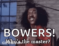Curly Hair Man Making Funny Face Saying Bowers Who's The Master GIF