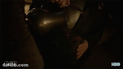 Curly Haired Bearded Man By Fire Got GIF