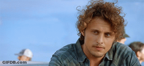 Curly Haired Bearded Man Green Plaid Shirt GIF
