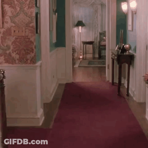 Curly Haired Bearded Man On City Street GIF