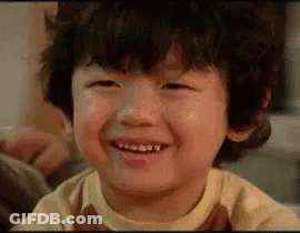 Curly-Haired Boy Smiling Eyes Closed GIF