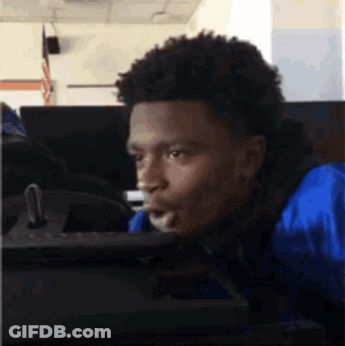 Curly-Haired Guy Pretends To Be Shocked GIF
