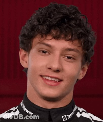 Curly Haired Man Black White Striped Shirt Good Question GIF