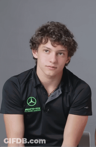 Curly Haired Man In Black AMG Shirt GIF