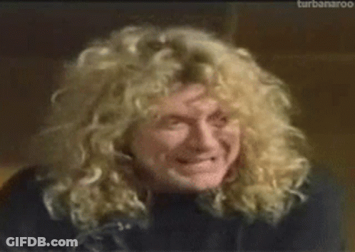 Curly Haired Man Smiling Eyes Closed GIF