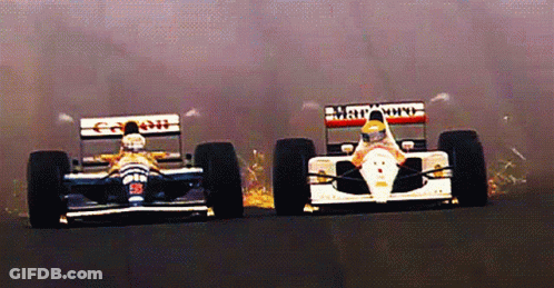Curly-Haired Man With I Race To Win Sign GIF