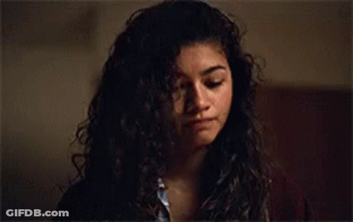 Curly Haired Woman Close Up GIF