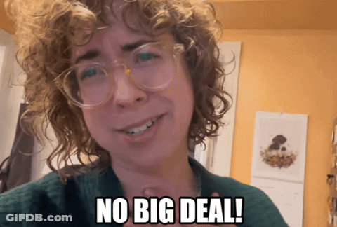 Curly-Haired Woman In Glasses No Big Deal GIF