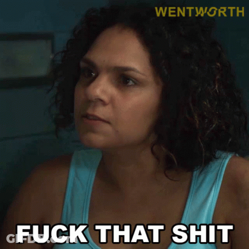Curly-Haired Woman Saying Fuck That Shit In Blue Tank Top GIF