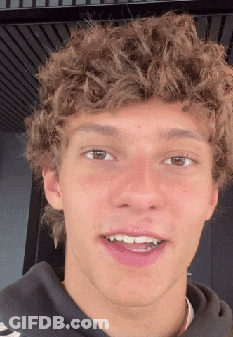 Curly Haired Young Man Staring Open Mouthed GIF
