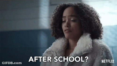 Curly Woman In White Fur Says After School GIF