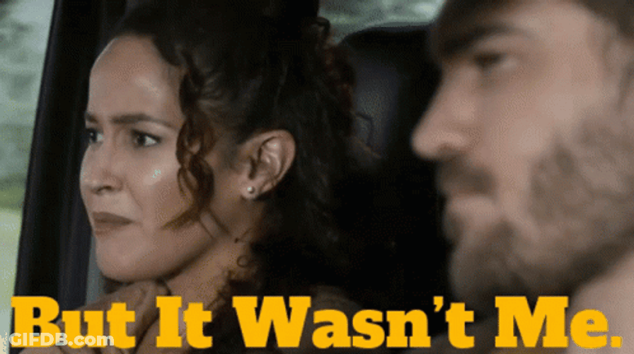 Curly Woman Saying It Wasnt Me GIF