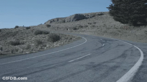 Curvy Road With White Line On Right Side GIF