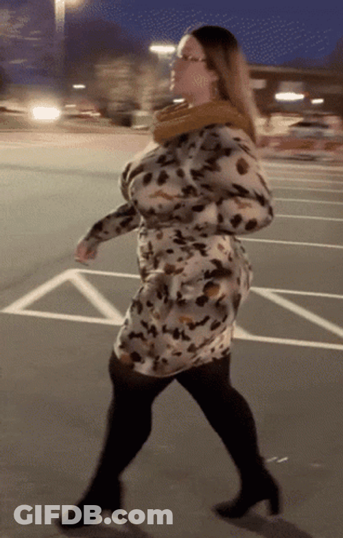 Curvy Woman Modeling Winter Clothes GIF