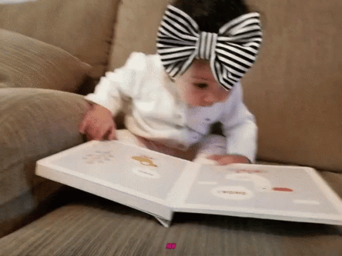 Cute Baby Exhausted Reading Book GIF