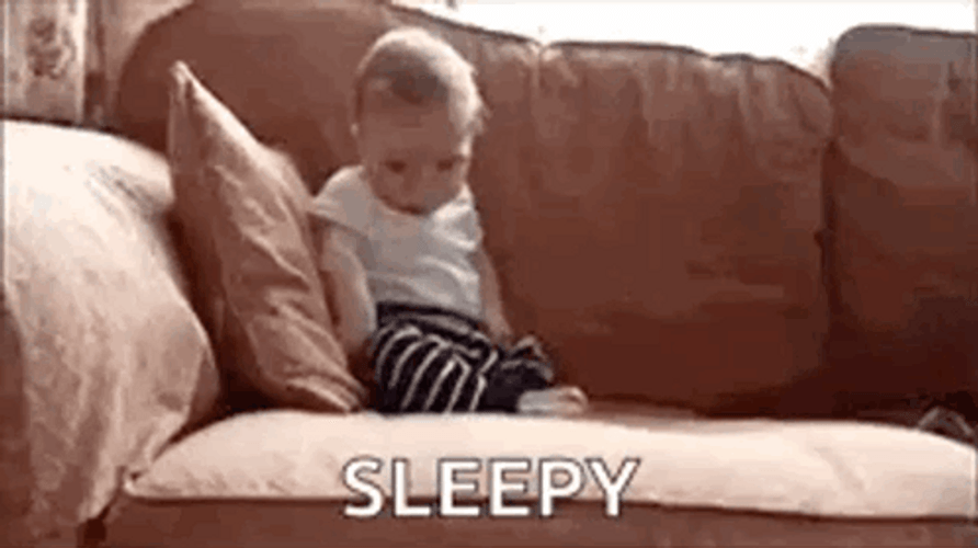 Cute Baby In Sofa Sleepy Meme GIF