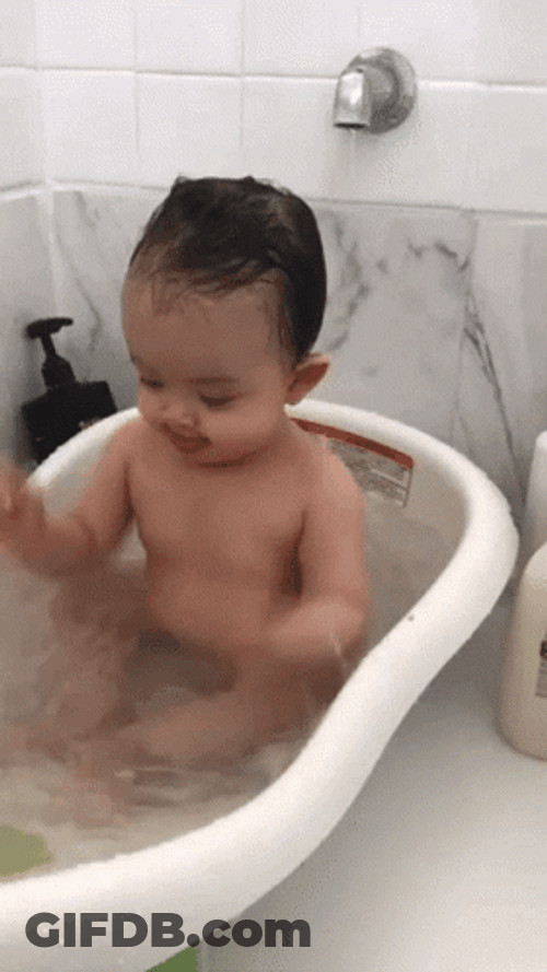 Cute Baby Plays During Bath GIF