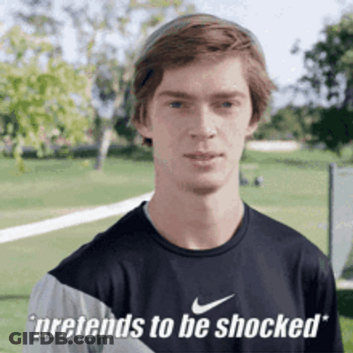 Cute Blonde Guy Pretends To Be Shocked GIF