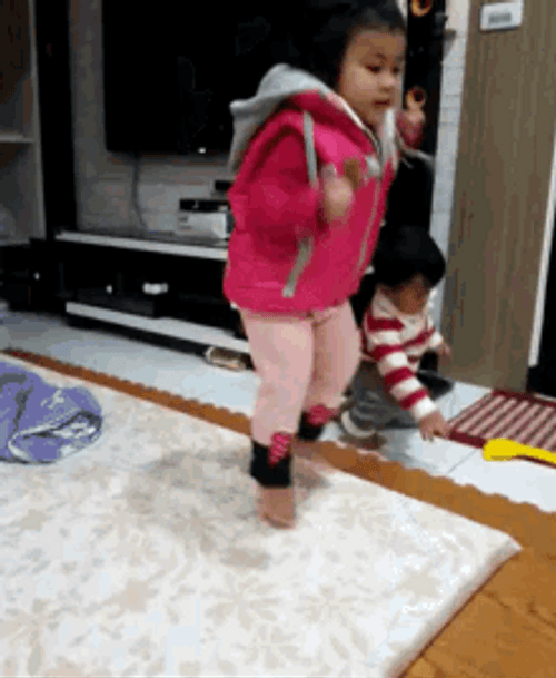 Cute Child Jumping Up And Down GIF