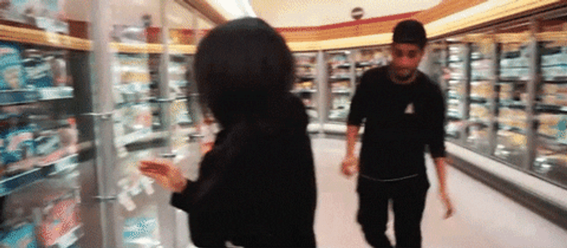 Cute Couples Playing At Grocery Store GIF