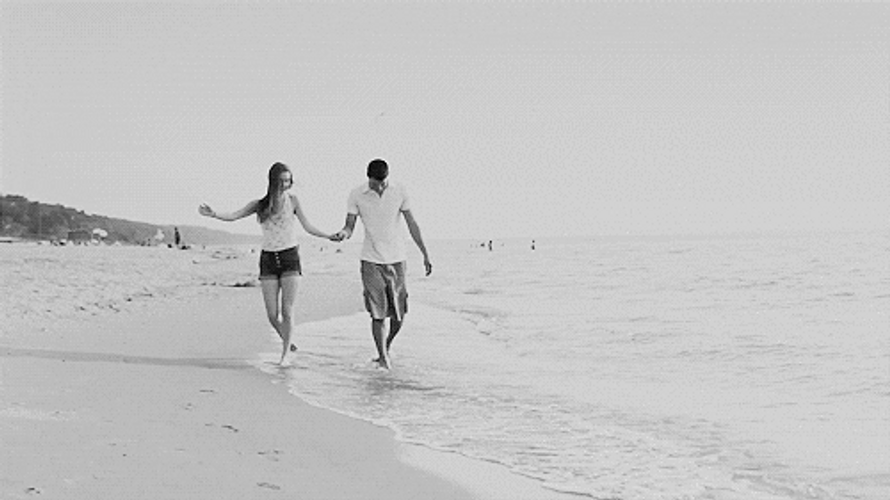 Cute Couples Walking On The Beach GIF