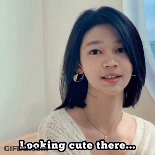 Cute Girl With Short Hair And Hoop Earrings GIF