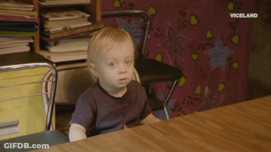 Cute Kid Sitting Blank Stare GIF