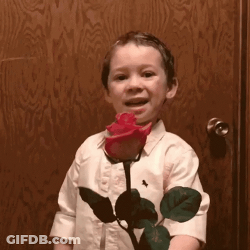 Cute Kid With Rose GIF