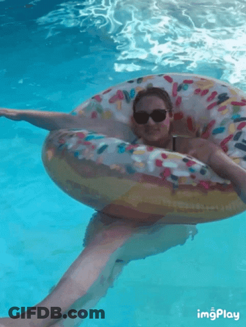 Cute Lady Floating In Donut Inflatable GIF
