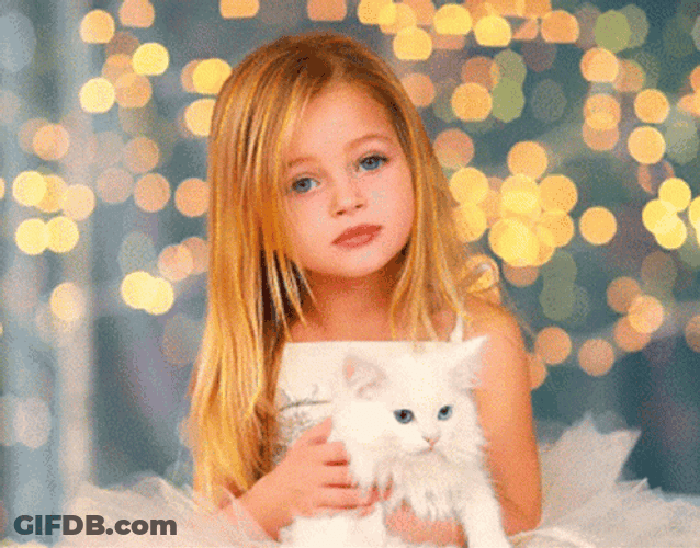 Cute Little Girl Holding A Cat GIF