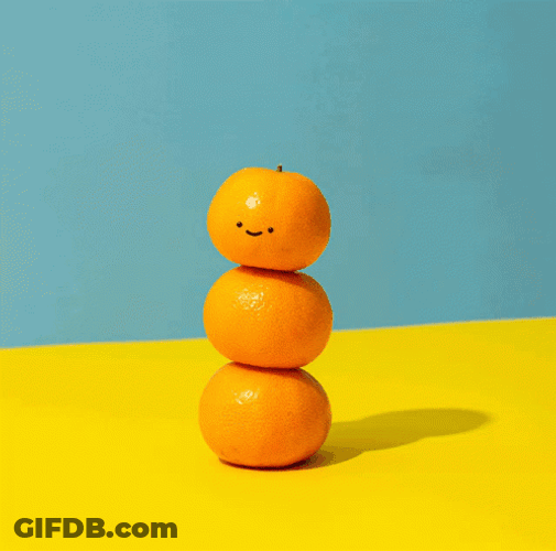 Cute Orange Smiling On Top Of Oranges GIF