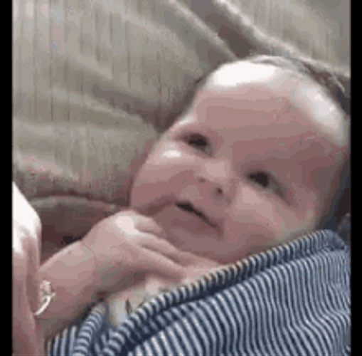 Cute Smiling Baby Flipping Off GIF