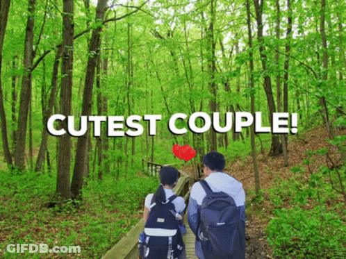 Cutest Couple Walking Through Forest GIF