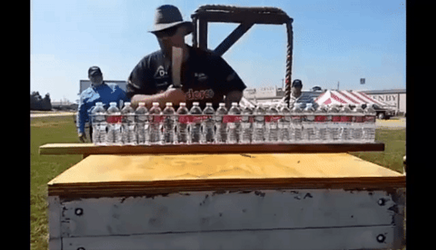 Cutting Water Bottles Using Sharp Knife GIF