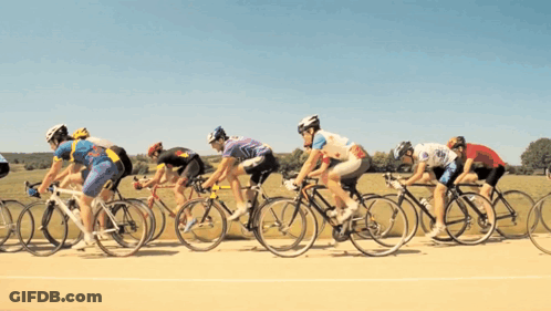 Cyclists Racing On Road GIF