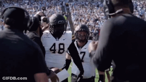 D. Evans Football Player In Helmet And Jersey GIF