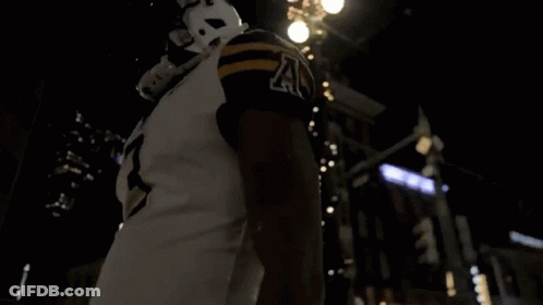 D. Evans Football Player In Helmet And Jersey GIF