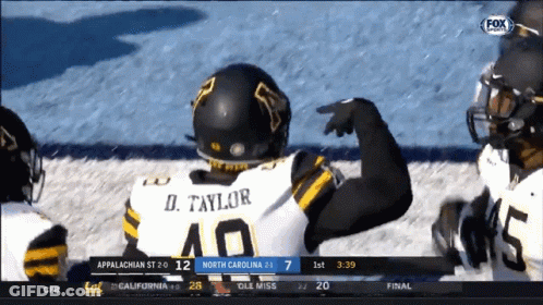 D. Taylor Football Player Pointing GIF