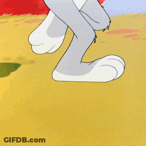 Daffy Duck Standing Next To Tree GIF
