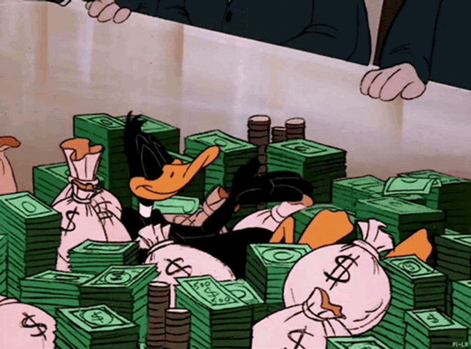 Daffy Laying On Bed Of Money GIF