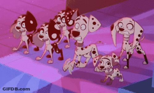 Dalmatian Dogs Standing In A Row GIF