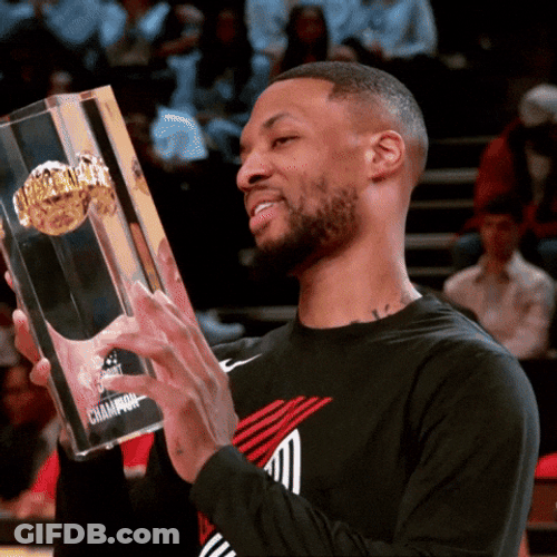 Damian Lillard Raising His Trophy GIF