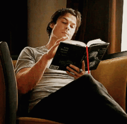 Damon Reading A Book Seriously GIF