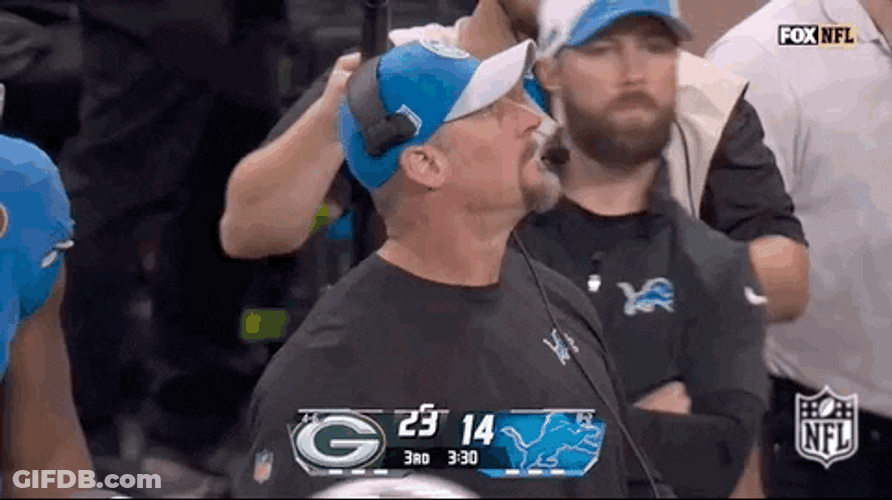 Dan Campbell Coach Look Up GIF