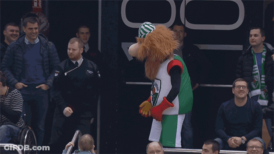 Dance Off Between Man And Mascot GIF