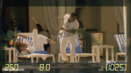 Dancing Couple Before Camera Saying Beta GIF